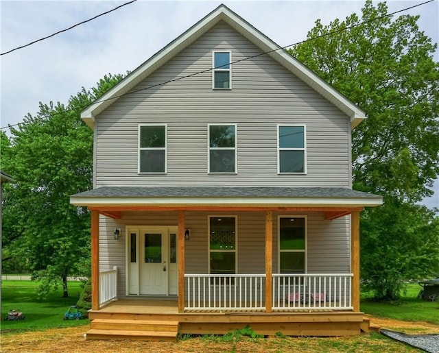 130 Center Ave, Burgettstown Boro, PA 15021 - view of front of home with a porch, a shingled roof, and a front yard