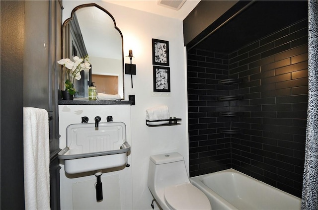 325 S Highland Ave Unit 105, Shadyside, PA 15206 - bathroom featuring toilet and washtub / shower combination