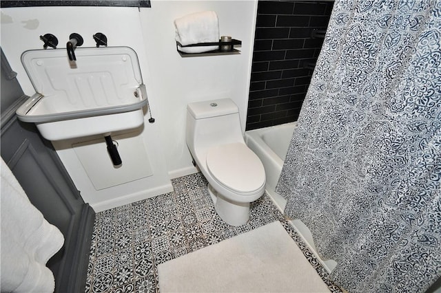 325 S Highland Ave Unit 105, Shadyside, PA 15206 - full bathroom featuring toilet and shower / bathtub combination with curtain