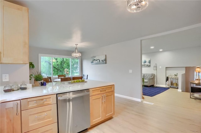 1611 18th Ave, Patterson Heights, PA 15010 - kitchen with stainless steel dishwasher, light brown cabinetry, a peninsula, and light wood finished floors