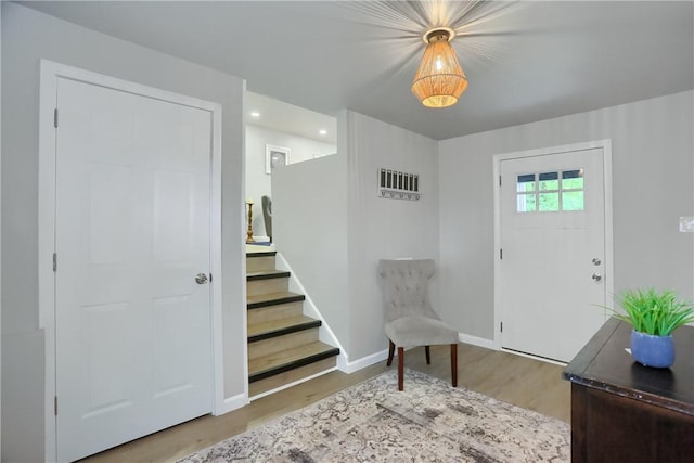 1611 18th Ave, Patterson Heights, PA 15010 - foyer entrance with wood finished floors, stairs, and recessed lighting