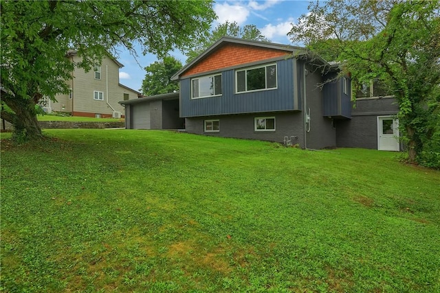 1611 18th Ave, Patterson Heights, PA 15010 - rear view of property with a yard and an attached garage