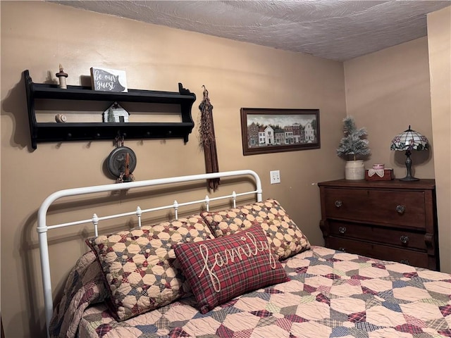 233 Grantz Hollow Rd, Bethel Twp, PA 15690 - bedroom featuring a textured ceiling