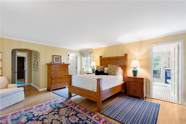 60 Longuevue Dr, Mt Lebanon, PA 15228 - bedroom with multiple windows, ornamental molding, light wood-style flooring, and arched walkways