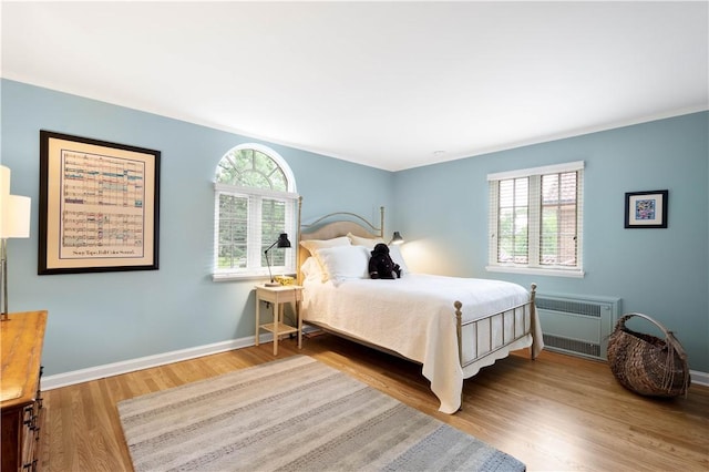 60 Longuevue Dr, Mt Lebanon, PA 15228 - bedroom with radiator heating unit and wood finished floors