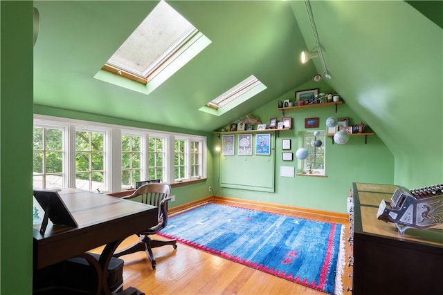 60 Longuevue Dr, Mt Lebanon, PA 15228 - office featuring a skylight, wood finished floors, vaulted ceiling, and rail lighting