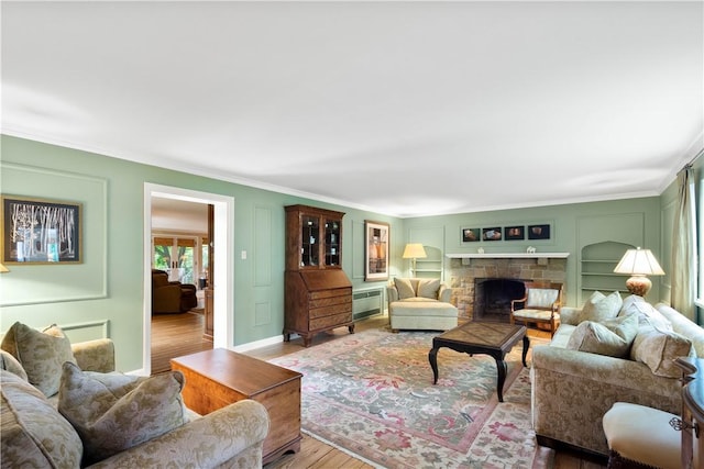 60 Longuevue Dr, Mt Lebanon, PA 15228 - living area with wood finished floors, crown molding, and a fireplace