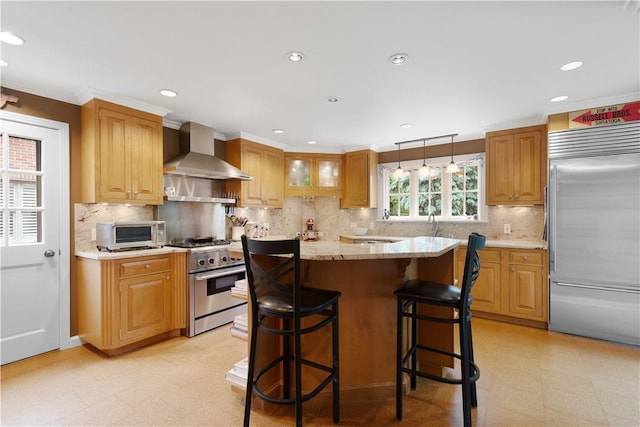 60 Longuevue Dr, Mt Lebanon, PA 15228 - kitchen featuring high quality appliances, wall chimney exhaust hood, light flooring, a center island, and a breakfast bar