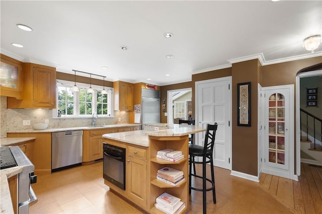 60 Longuevue Dr, Mt Lebanon, PA 15228 - kitchen with stainless steel appliances, a breakfast bar area, tasteful backsplash, open shelves, and a center island