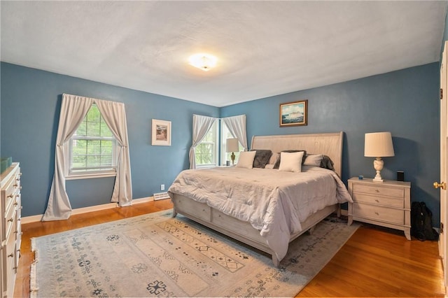 1026 Cambridge St, Harrison Twp, PA 15065 - bedroom with multiple windows and wood finished floors