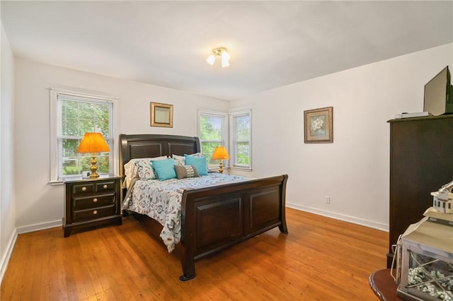 1026 Cambridge St, Harrison Twp, PA 15065 - bedroom with multiple windows and hardwood / wood-style floors
