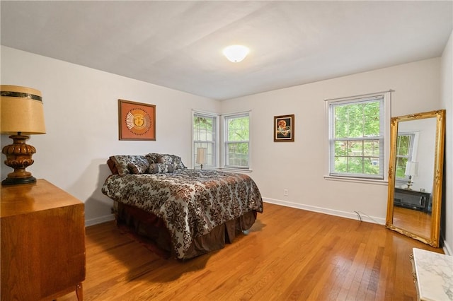 1026 Cambridge St, Harrison Twp, PA 15065 - bedroom featuring light wood-style floors and multiple windows