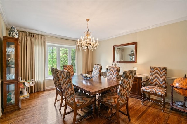 1026 Cambridge St, Harrison Twp, PA 15065 - dining area with crown molding, a chandelier, and wood finished floors