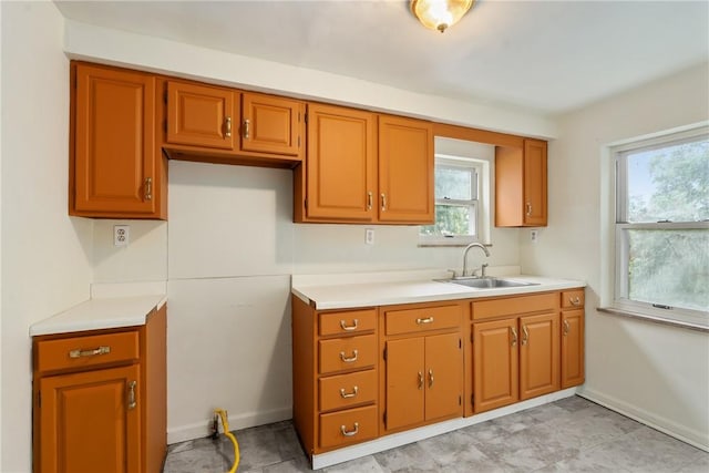 1113-1115 Woodbine, Stanton Heights, PA 15201 - kitchen featuring light countertops and brown cabinets
