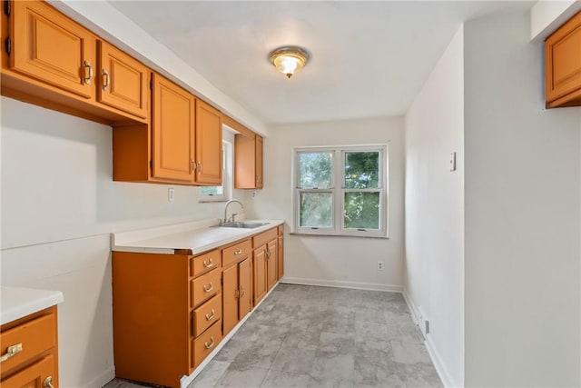 1113-1115 Woodbine, Stanton Heights, PA 15201 - kitchen featuring light countertops and brown cabinets