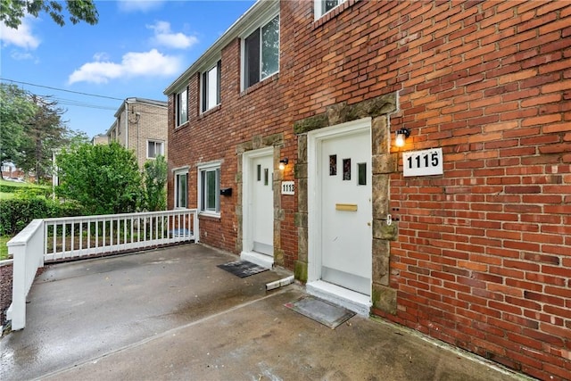 1113-1115 Woodbine, Stanton Heights, PA 15201 - doorway to property featuring brick siding