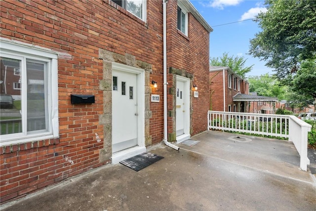 1113-1115 Woodbine, Stanton Heights, PA 15201 - entrance to property featuring brick siding and covered porch