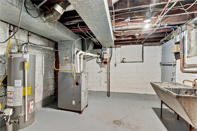1113-1115 Woodbine, Stanton Heights, PA 15201 - unfinished below grade area featuring water heater and heating unit