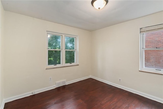 1113-1115 Woodbine, Stanton Heights, PA 15201 - empty room with baseboards and dark wood-style floors