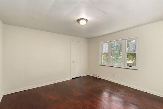1113-1115 Woodbine, Stanton Heights, PA 15201 - spare room featuring dark wood finished floors and baseboards