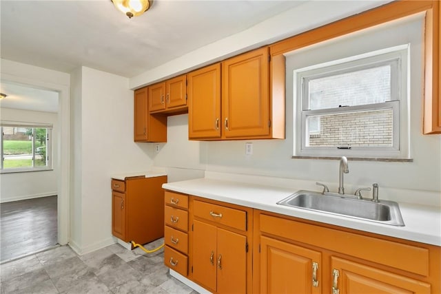 1113-1115 Woodbine, Stanton Heights, PA 15201 - kitchen with light countertops and brown cabinets