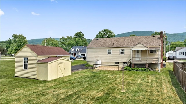 157 Elizabeth St, South Union Twp, PA 15445 - back of house with a storage unit and a mountain view