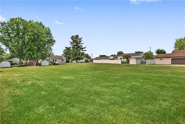 157 Elizabeth St, South Union Twp, PA 15445 - view of green lawn with a storage shed and a residential view