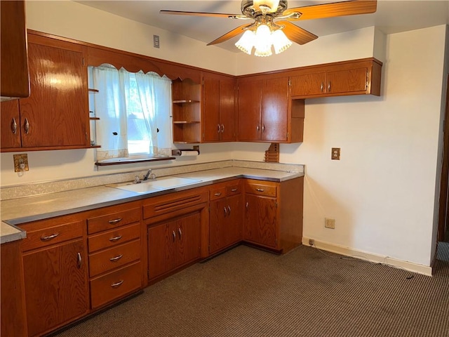 157 Elizabeth St, South Union Twp, PA 15445 - kitchen featuring open shelves, brown cabinetry, a ceiling fan, light countertops, and dark carpet