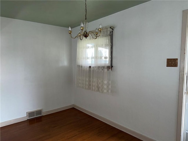 157 Elizabeth St, South Union Twp, PA 15445 - empty room featuring a chandelier and dark wood-type flooring