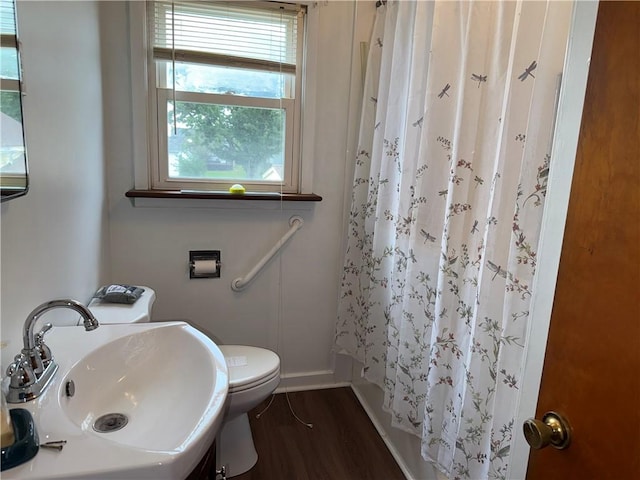 157 Elizabeth St, South Union Twp, PA 15445 - full bathroom featuring curtained shower and wood finished floors