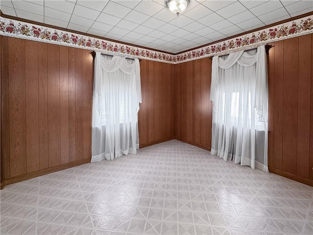 979 9th St, Taylor Twp, PA 16160 - spare room with light flooring and wood walls