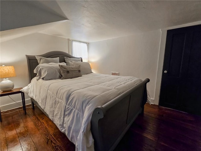 1638 Lake Rd, Pa, PA 16137 - bedroom with dark wood finished floors and a textured ceiling