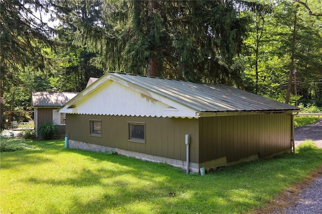 1638 Lake Rd, Pa, PA 16137 - view of property exterior featuring a lawn and a metal roof