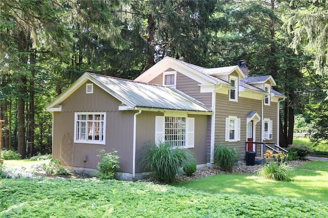 1638 Lake Rd, Pa, PA 16137 - view of front of property featuring a chimney and a front yard