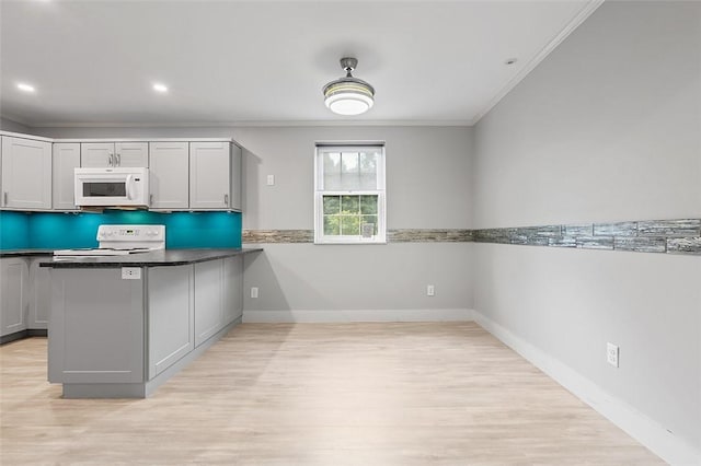 105 Camelot Dr, Mccandless, PA 15237 - kitchen featuring white appliances, ornamental molding, light wood-style flooring, gray cabinets, and a peninsula