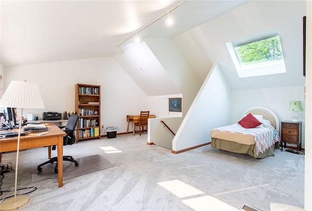 311 Oxbridge Ct, Ohara, PA 15238 - bedroom with rail lighting, carpet, vaulted ceiling, a skylight, and an office area