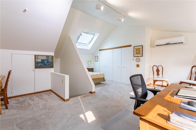 311 Oxbridge Ct, Ohara, PA 15238 - office space with a skylight, lofted ceiling, an AC wall unit, carpet flooring, and rail lighting