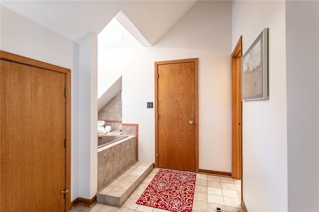 311 Oxbridge Ct, Ohara, PA 15238 - full bath featuring a bath, tile patterned flooring, and lofted ceiling