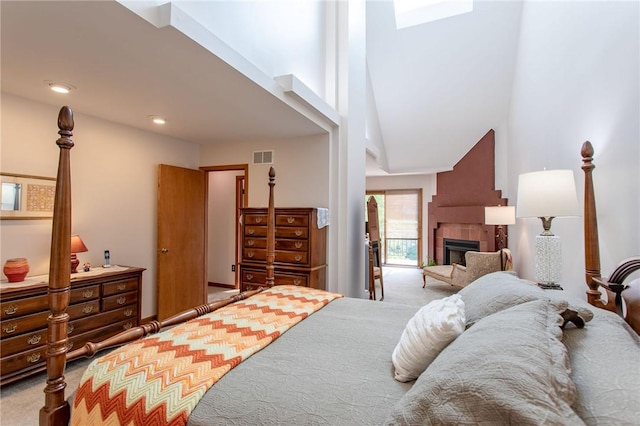311 Oxbridge Ct, Ohara, PA 15238 - bedroom featuring carpet, a tiled fireplace, and high vaulted ceiling