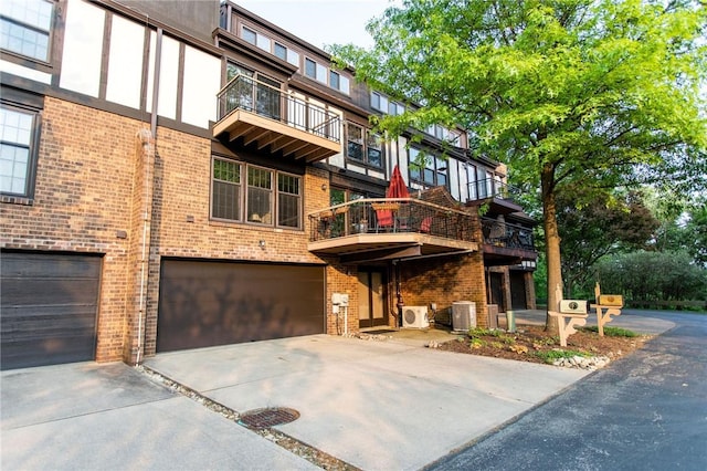 311 Oxbridge Ct, Ohara, PA 15238 - view of property featuring an attached garage and driveway