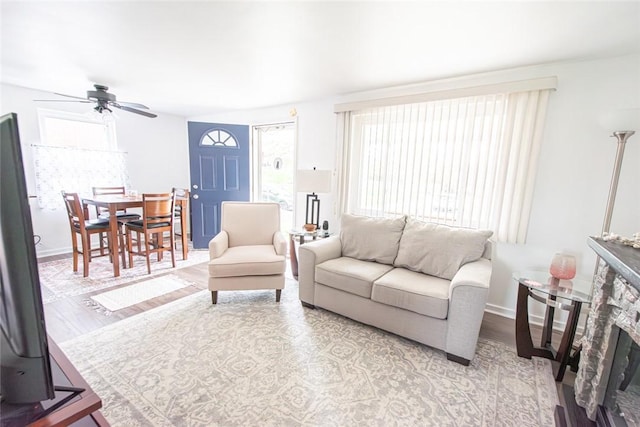 502 Lebanon Manor Dr, West Mifflin, PA 15122 - living room with ceiling fan and wood finished floors