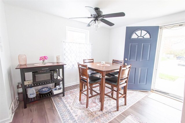 502 Lebanon Manor Dr, West Mifflin, PA 15122 - dining area with ceiling fan and wood finished floors