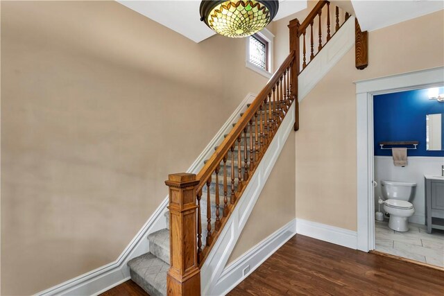 122 Haldane St, Crafton, PA 15205 - stairs with baseboards and wood finished floors