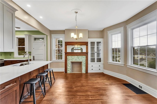 122 Haldane St, Crafton, PA 15205 - living area featuring a chandelier, wood finished floors, and recessed lighting