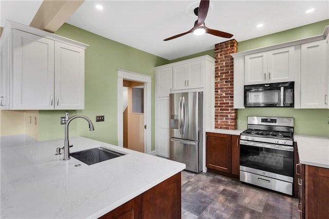 122 Haldane St, Crafton, PA 15205 - kitchen with stainless steel appliances, ceiling fan, white cabinetry, and recessed lighting