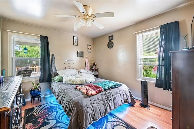 965 Dalton Ave, Hermitage, PA 16148 - bedroom with multiple windows, wood finished floors, and ceiling fan
