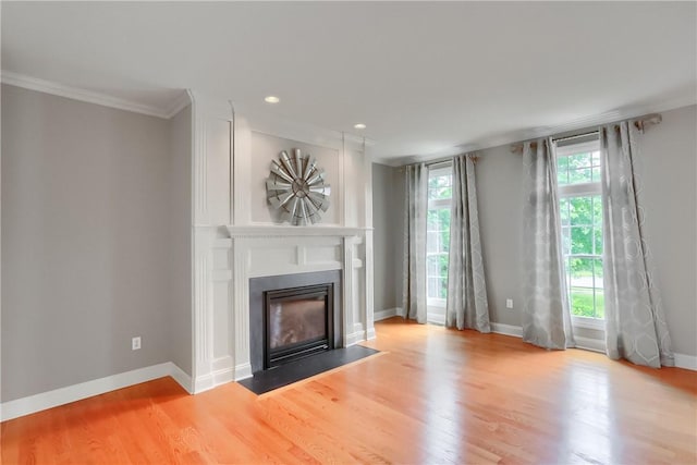 4127 Duckhorn Dr, Moon/Crescent Twp, PA 15108 - unfurnished living room with a fireplace with flush hearth, wood finished floors, ornamental molding, and recessed lighting