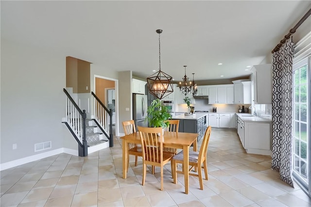 4127 Duckhorn Dr, Moon/Crescent Twp, PA 15108 - dining space featuring a chandelier, stairs, recessed lighting, and light tile patterned floors