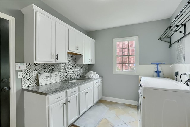 4127 Duckhorn Dr, Moon/Crescent Twp, PA 15108 - laundry area featuring cabinet space, washing machine and clothes dryer, and light tile patterned flooring