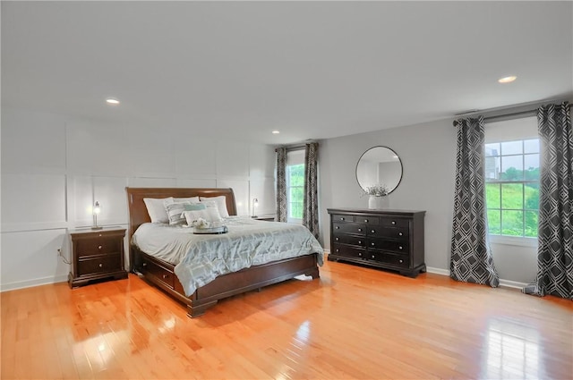 4127 Duckhorn Dr, Moon/Crescent Twp, PA 15108 - bedroom with wood finished floors, a decorative wall, and recessed lighting